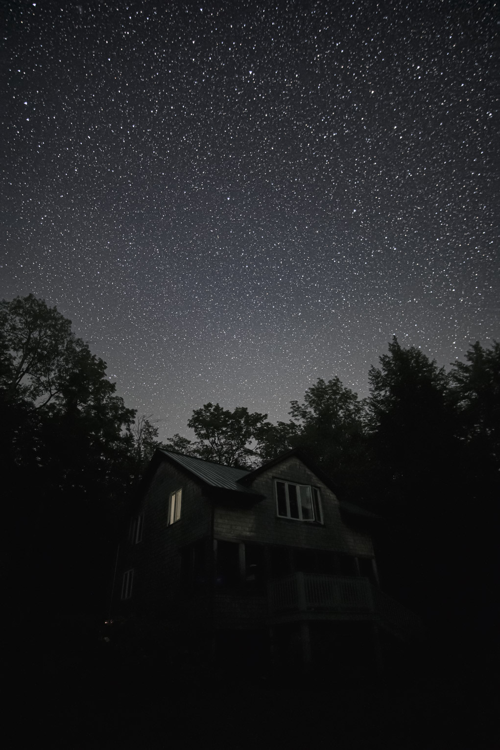 The starry sky above a cabin